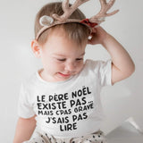 T-shirt pour bébé le père noël existe pas mais c'pas grave j'sais pas lire humour